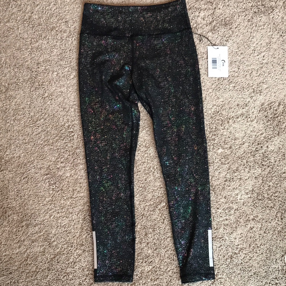 Zyia black reflective mirage light n tight size 4